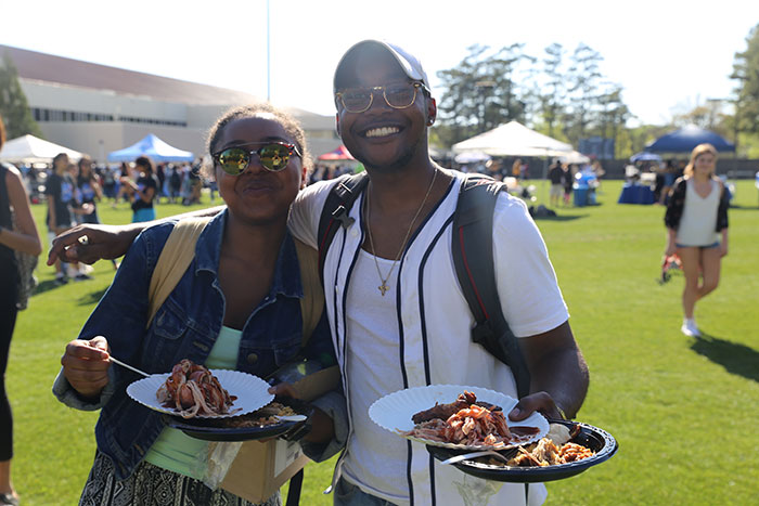 Students pose for photos at Dooley's Week events.