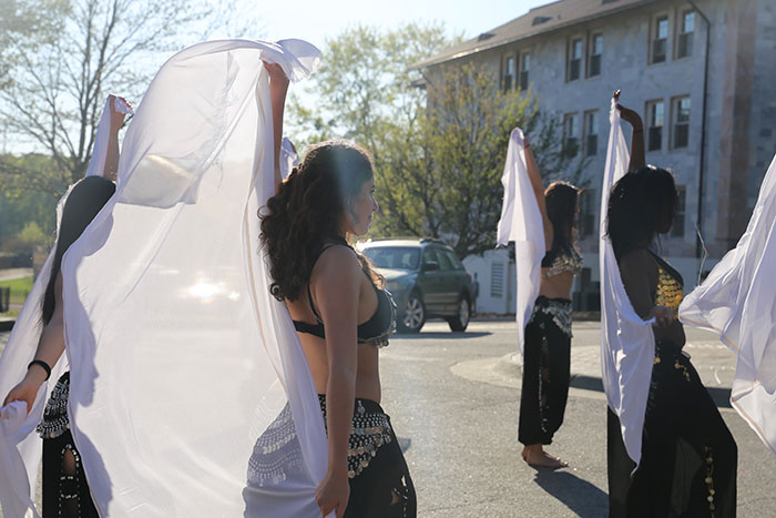 Students perform at Dooley's Week events.