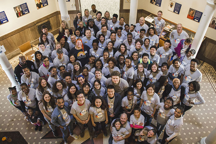 A group of students gather on Oxford's campus to help pack supplies and holiday gifts