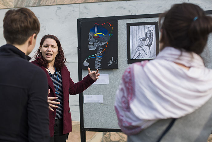 Maureen Ascona speaks about her painting.