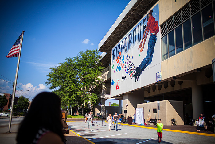 woman looking at artwork