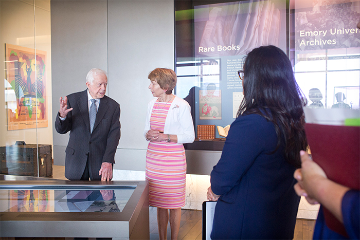 jimmy carter and rosemary mcgee look at displays