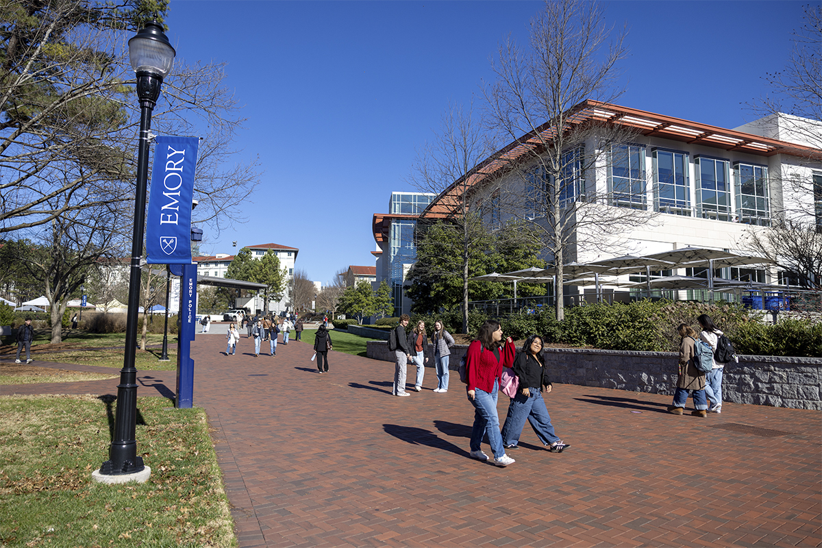 college students walking across Emory University campus