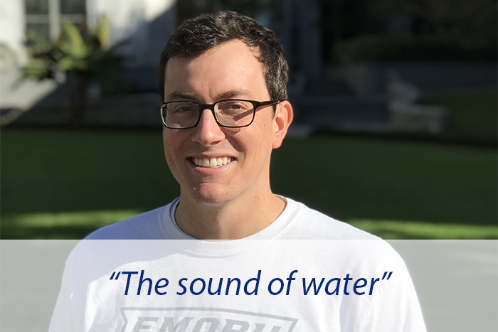 An Emory student poses and explains that he'd most miss the sound of water.