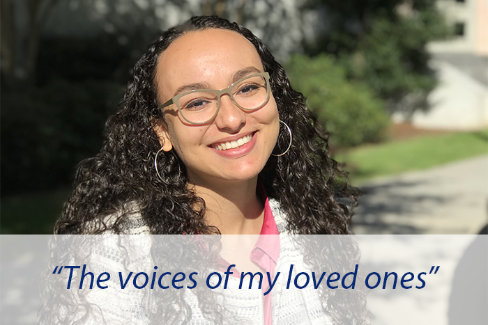 An Emory student poses and explains that she'd most miss the voices of her loved ones.