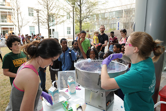 Several children watch a demonstration at the 2017 Atlanta Science Festival.