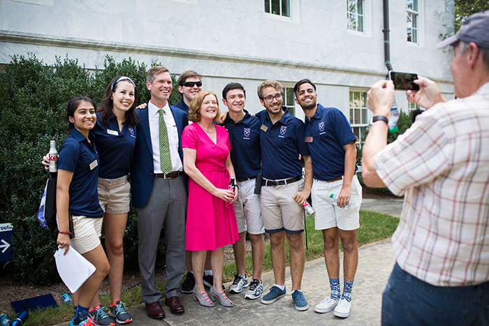 Emory President Claire E. Sterk poses with the Emory College dean and student leaders at the 2017 Coke Toast.