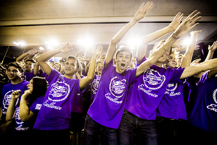 A group of students cheer at Songfest.
