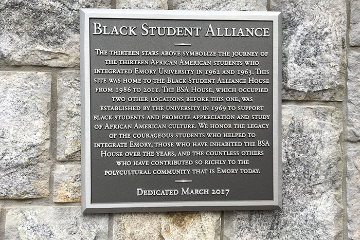 The dedication plaque reads: "¿The thirteen stars above symbolize the journey of the thirteen African American students who integrated Emory University in 1962 and 1963.¿