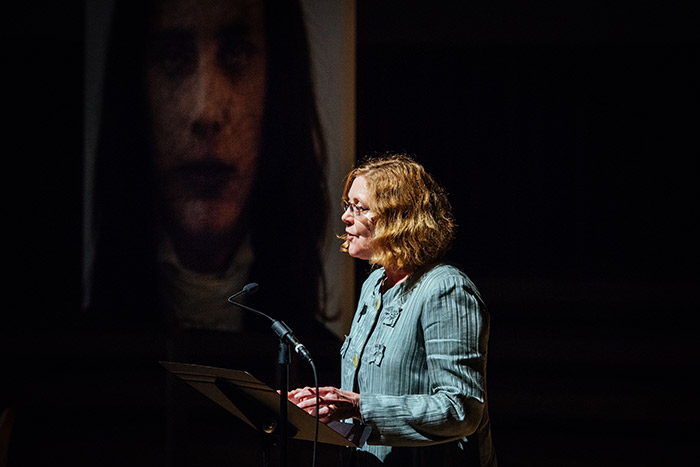 Emory President Claire E. Sterk spoke at the unveiling.
