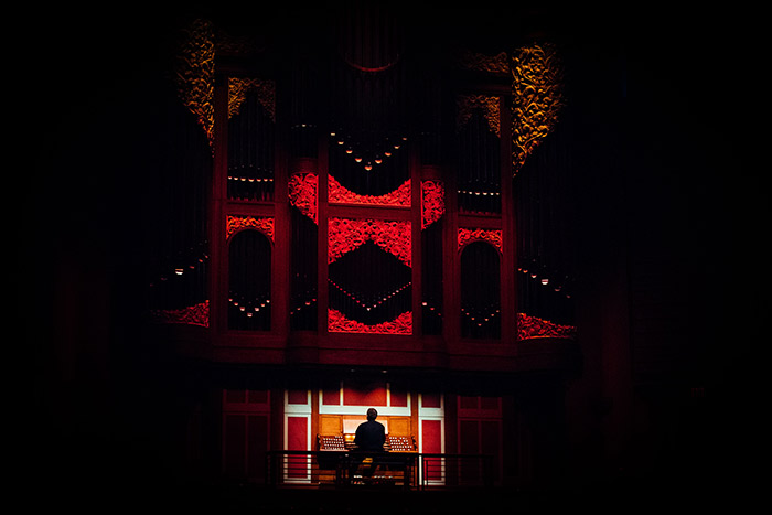 Emory's Timothy Albrecht played the organ in low-lighting throughout the event to help set the mood.