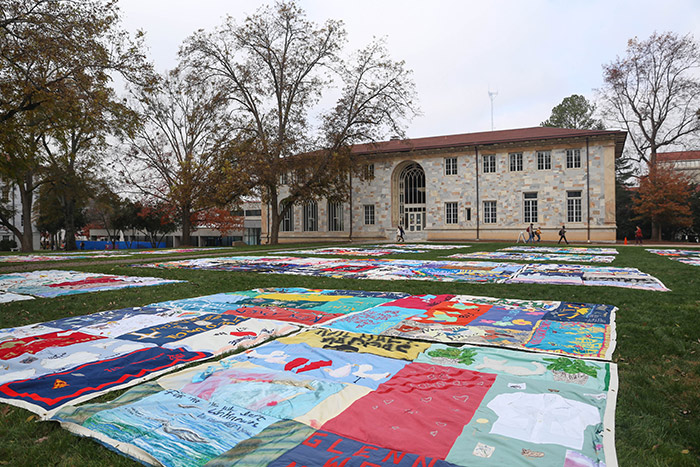 Dozens of quilts lay spread out across the Emory quad to commemorate World AIDS Day.