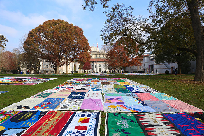 Dozens of quilts lay spread out across the Emory quad to commemorate World AIDS Day.