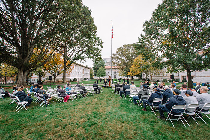 The crowd composed of many in the Emory community listens to President Claire E. Sterk at the 2017 Veterans Day Ceremony.