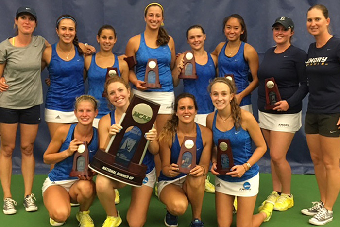The Emory women's tennis team proudly stands together after placing second in the NCAA Division III Championships.