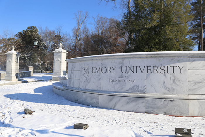 Emory gate coated with snow