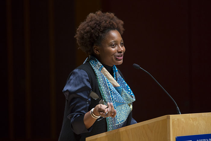 Tracy K. Smith speaks to the crowd from a podium