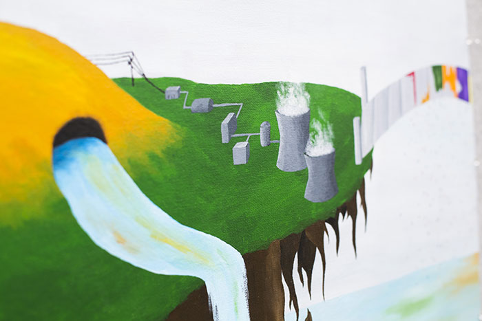 Kate Bernart's painting portrays Austin Ladshaw's research at Georgia Tech on the nuclear fuel cycle.