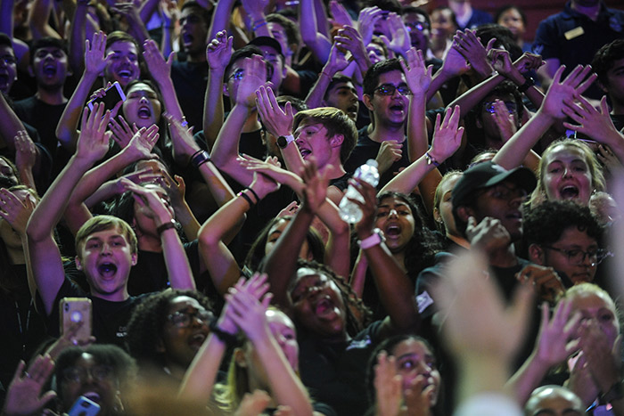 A crowd of students cheer at Songfest