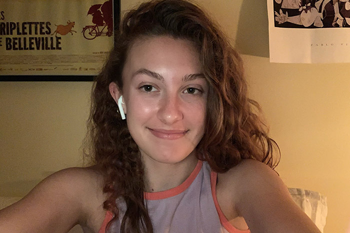Bronwen Boyd poses with earbuds in her ears