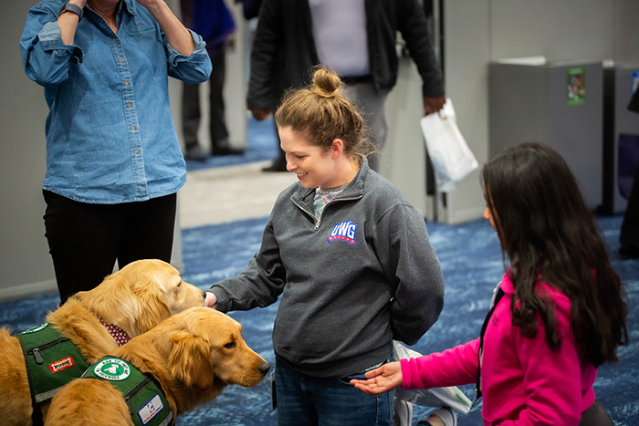 Emory employees pet a therapy dog