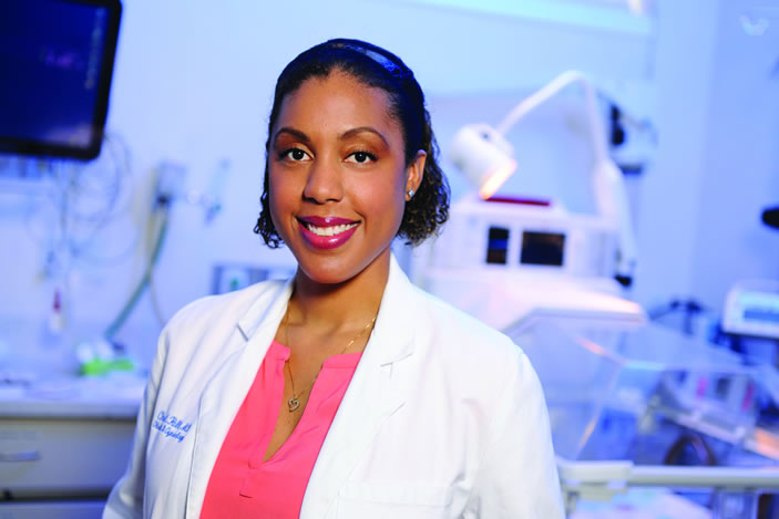 Obstetrician Cherie Hill, an assistant professor in Emory's medical school, often has to balance the health of a mother with the early delivery of a child. Premature infant at Emory University Hospital Midtown are cared for in the NICU.