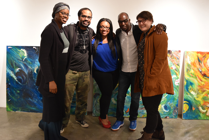 "Art and Social Engagement" participants pose with a mural created for Solomon's Temple.