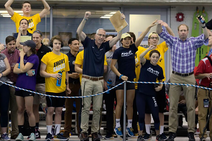 fans cheer swimmers
