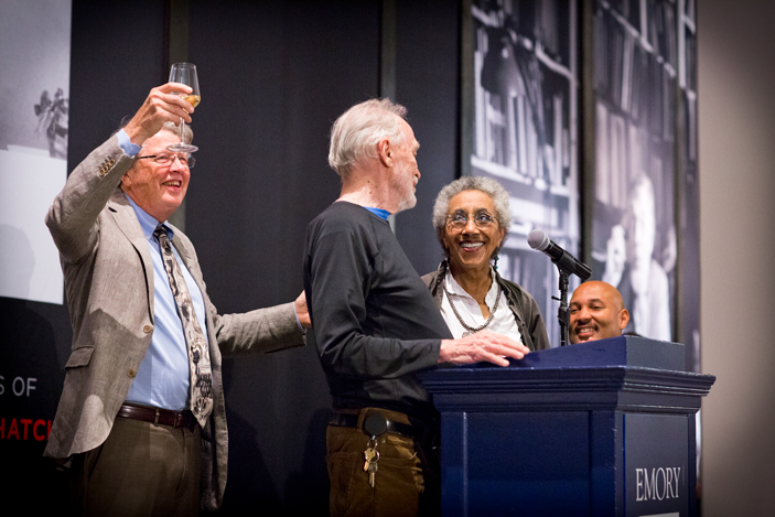 Randall Burkett curator of African American collections for the Rose Library, raises a toast to James Hatch and Camille Billops.