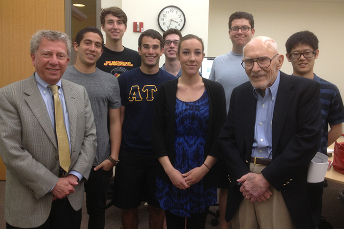 Claude Sitton returned to Emory to teach from 1991 to 1994 and later served as a guest speaker in journalism classes. Here, he poses with Professor Hank Klibanoff and students in Klibanoff¿s 2013 freshman seminar on news coverage of race.