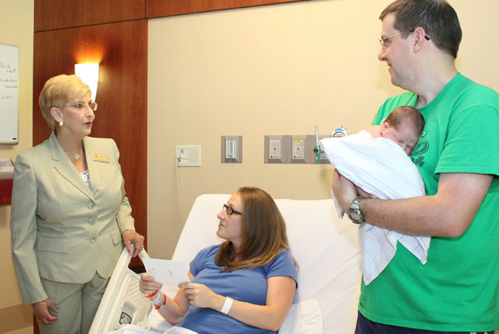 At Emory Johns Creek Hospital, the First Lady offers congratulations to parents Rebecca and Billy on the birth of their son, Everett. She tells them about the new initiative, which encourages newborn vaccinations.
