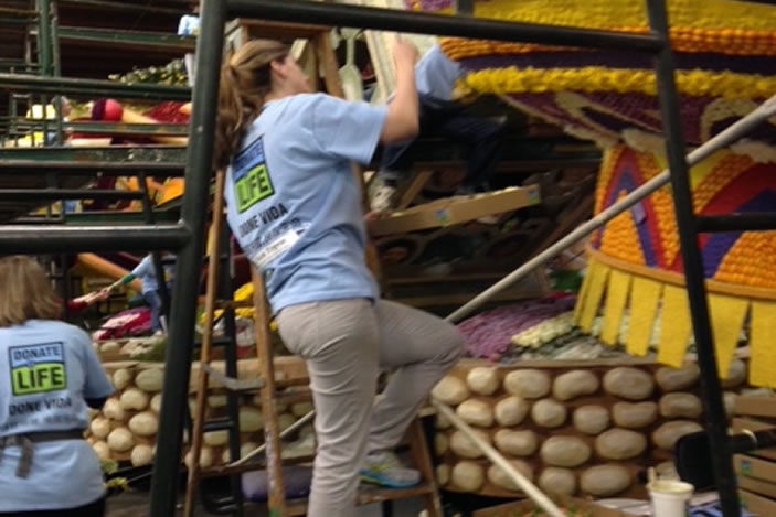 Dr. Nicole Turgeon hard at work decorating the Donate Life float.