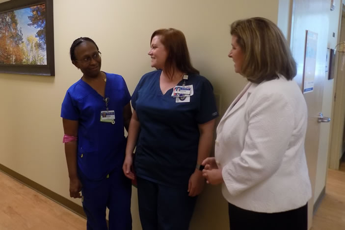 Karen Handel meets with nurses in Winship's Infusion Center.