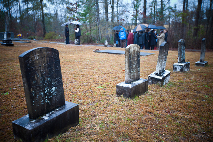 Relatives of others who had voted on that fateful day in 1948 joined Isaiah Nixon's family and Emory students for the Jan. 22 visit to the gravesite.