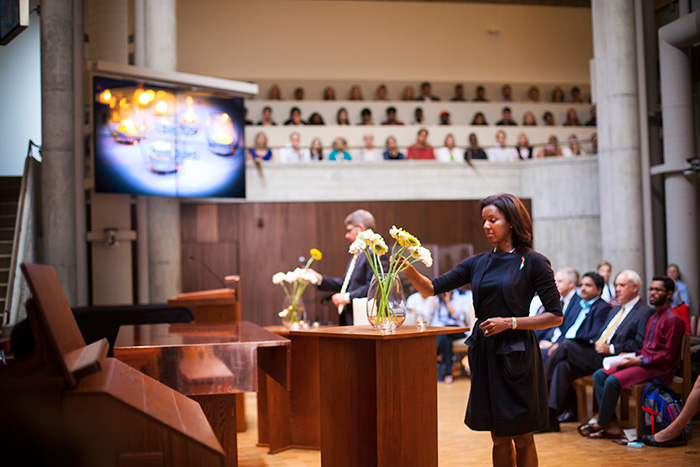 The music stopped and the chapel was silent as Erika James, dean of Goizueta Business School, and Douglas Hicks, dean-elect of Oxford College, placed the final two flowers, representing their students.