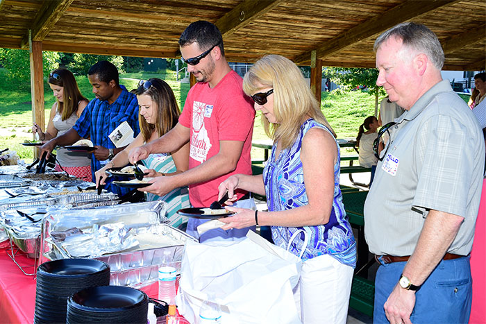 At the "Team Ebola" Family Picnic, staff and their family members enjoy a Mexican feast.