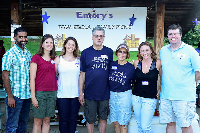 "Team Ebola" physicians Jay Varkey and Colleen Kraft; Sharon Vanairsdale, SCDU program director; Bruce Ribner, physician and SCDU medical director; Barb Ribner, his wife; Sonia Bell, SCDU program coordinator; and Marshall Lyon, physician.