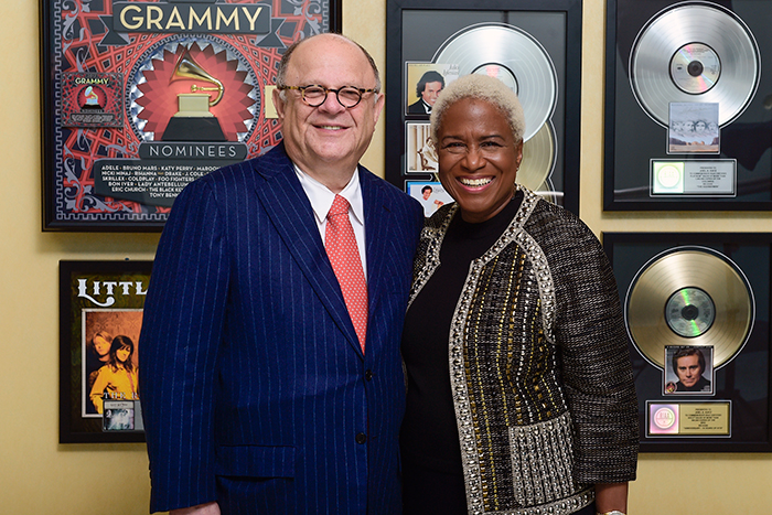 Joel Katz poses with former Atlanta television anchor Monica Person at the opening of the Joel A. Katz Music is Medicine Collection.