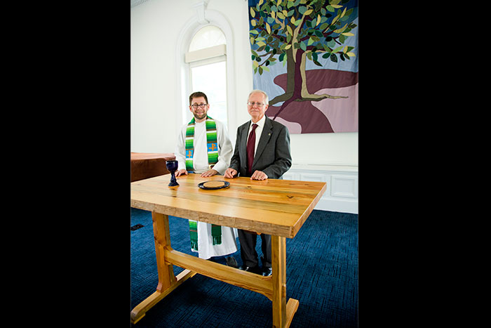 Oxford Chaplain Lyn Pace and Dean Stephen Bowen with the table made by Bowen for the college chapel. 