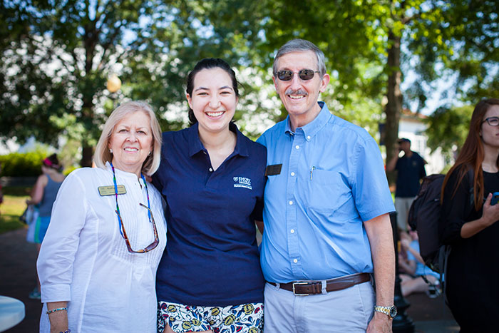 Emory alumni pose at the welcome block party for President Sterk.