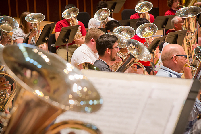 A International Euphonium Tuba Festival attendees play tuba during practice.