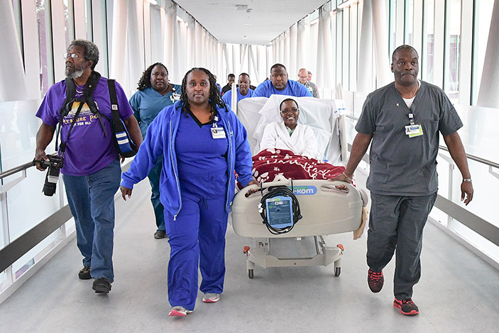  Crystal McCollum from Ellenwood, Ga., is the first inpatient moved into the new hospital tower on Saturday, Aug. 26.