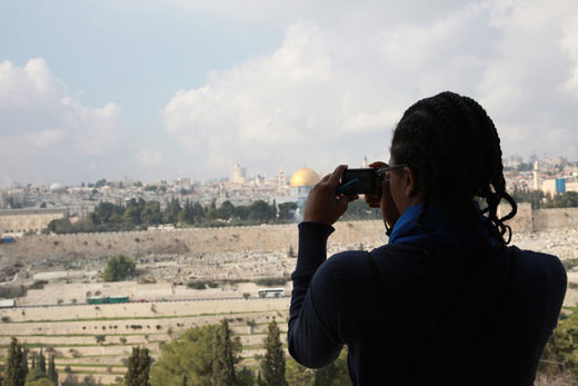 Kassa Elliott `03C viewing Jerusalem from the Mount of Olives. Photo by Carlton Mackey.