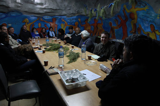 Daoud Nassar, Tent of Nations, met with the group in a cave because he¿s not allowed to build structures on his land. Photo by Carlton Mackey.