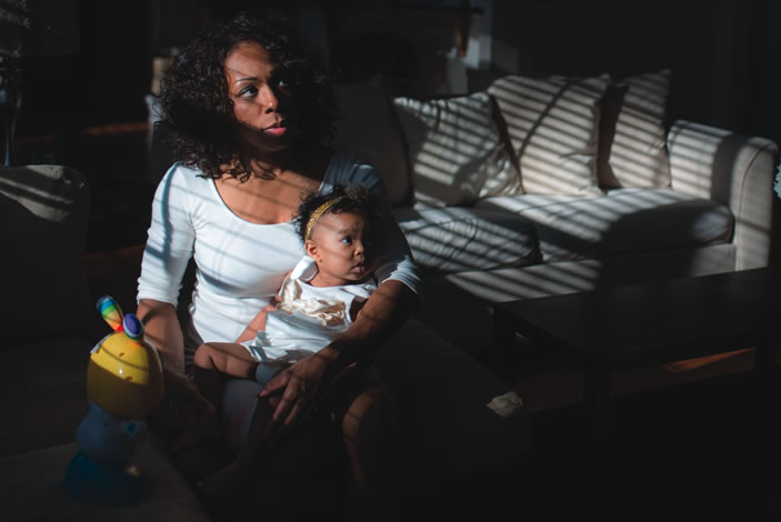 Ebony Foreman-Broaddus, who particpated in a School of Nursing study, shown with her daughter Eden, at their home in Conyers, Georgia. 