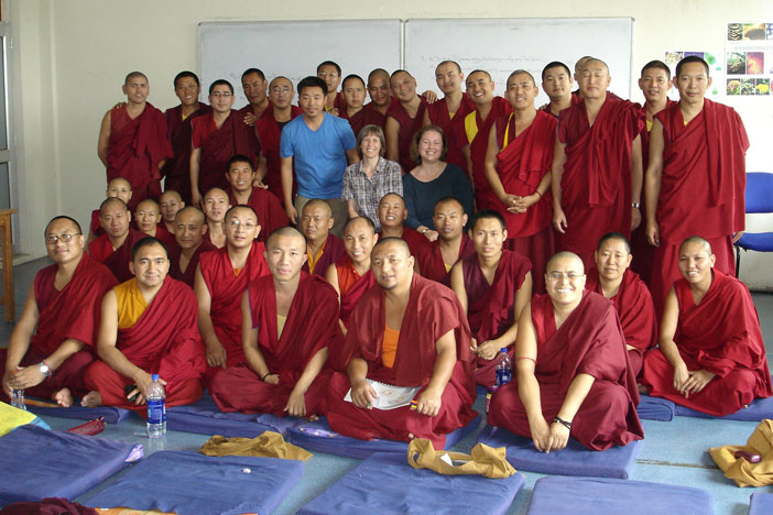 Emory biology lecturer Karen Passalacqua (center left) taught Tibetan monks at Dharamsala as part of this year¿s segment of the Emory Tibetan Science Initiative. 