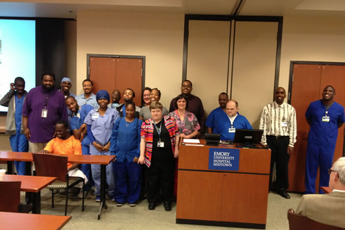 Project Search employees gather at Emory University Hospital Midtown to celebrate the 10-year anniversary of the program. The program provides employment for often hard-to-fill hospital positions with young people who have developmental disabilities.