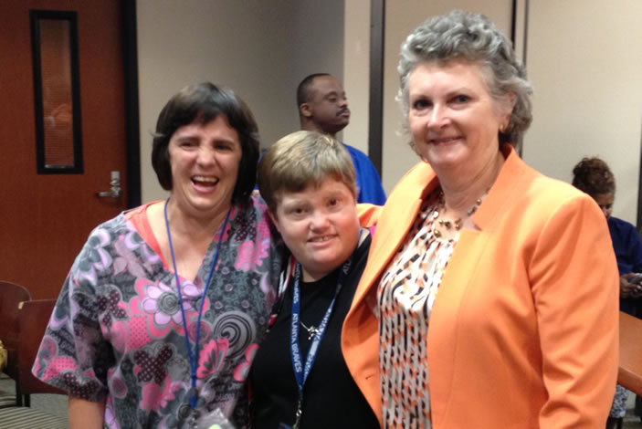 Project Search employees Margaret Whitley and Anne McKinnon, along with McKinnon's supervisor, Roxann Arnold, director of Patient Financial Services for Emory hospitals.