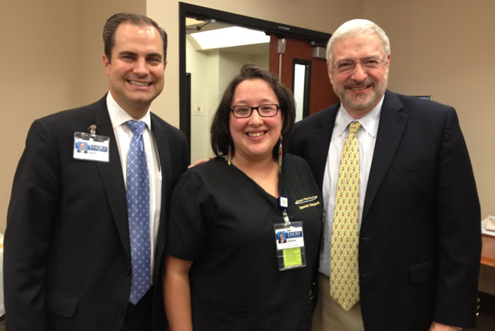 From left to right: Dane Peterson, Emory University Hospital Midtown CEO, Zelyna Cano, Project Search employee and Al Blackwelder, former Emory University Hospital Midtown CEO, who started the Project Search program at the hospital.