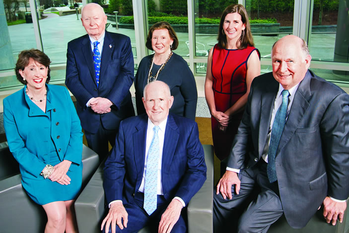 The buildings that comprise the RSPH are named to honor the Rollins family. They include Pam Rollins (front row, left), Randall Rollins, Gary Rollins, Amy Rollins Kreisler (back row, right), and Peggy Rollins. Henry Tippie (back row, left) is a trustee of the O. Wayne Rollins Foundation.